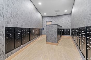 a wine cellar with rows of wine racks and wooden floors